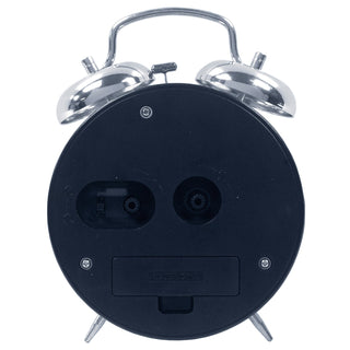 The back view of a classic twin-bell alarm clock, showing the black plastic casing, silver metal bells, and feet against a white background.
