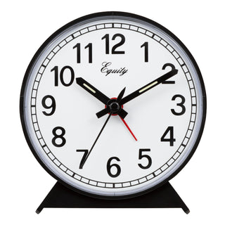 A round analog desk clock with a black frame and stand, featuring a white face, bold black numerals, black hands, and a red second hand. The brand name 'Equity' is printed in script on the upper half of the dial.