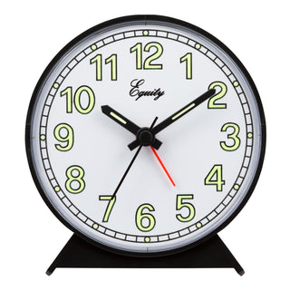 Head-on image of the 14077 Quartz Analog Alarm Clock featuring a round black plastic frame and base with a white dial, green luminous numerals, black hour, minute, and second hands, and a red alarm indicator.