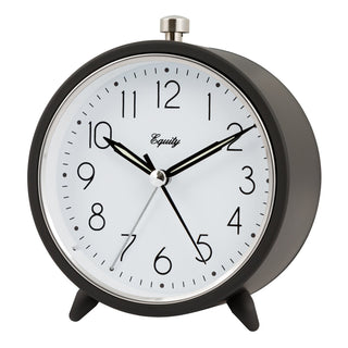 A classic round analog desk clock with a black metal body, white face, black numerals and hands, and a silver top button. The brand name 'Equity' is printed on the clock face.