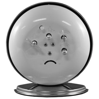 Back of alarm clock show setting knobs. 