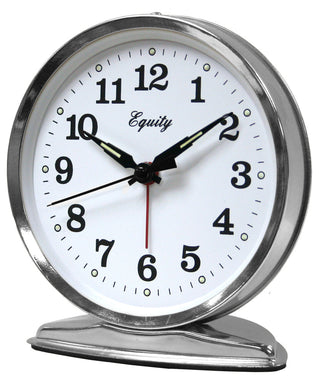 A classic round desk clock with a polished chrome silver metal frame and base, featuring a white dial with black Arabic numerals and hands, and the brand name 'Equity' printed in script.