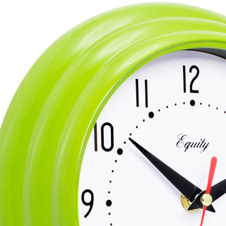 Close-up of a wall clock with a glossy green curved frame, a white face, black numerals and hands, and a red second hand. The word 'Equity' is printed on the dial.