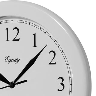 Close-up frame image of the 25201 10-inch Basics Wall Clock - White. The clock features a white frame with a white dial, black numbers, and black metal hands.