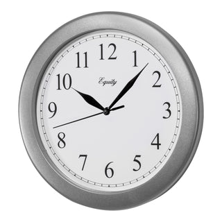 Left-facing image of the 25206 10-inch Basics Wall Clock - Silver. The clock features a silver frame with a white dial, black numbers, and black metal hands.