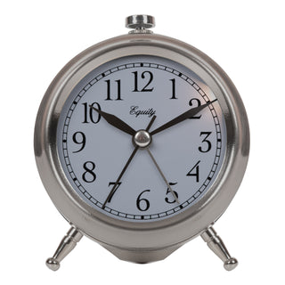 A classic round silver alarm clock with a light  face, black numerals, and black hands, supported by two small legs on a white background.