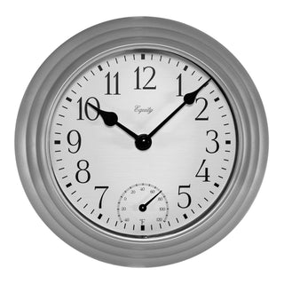 A round wall clock with a brushed silver metallic frame, a white dial face, black Arabic numerals, black hands, and a small seconds subdial at the bottom, shown against a plain white background.
