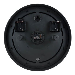 Back image of the 403-3246BR Lighted Lux 18-inch indoor outdoor wall clock, with the weather-resistant battery covers removed, showing the quartz movement battery compartment and the additional battery compartments for the lighted dial function