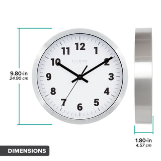 Orthographic image showing the 404-2626 10-inch Nash Wall Clock head on with diameter dimensions and in profile showing the depth of the silver finish metal frame at 1.80 inches. The white dial features black numbers and black metal hands: hour, minute, second.