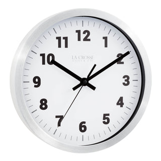 Right facing view of the Nash 404-2626 Wall Clock with a silver metal flush mount frame surrounding a white dial with black numbers, hour, minute and second hands and gray time markings