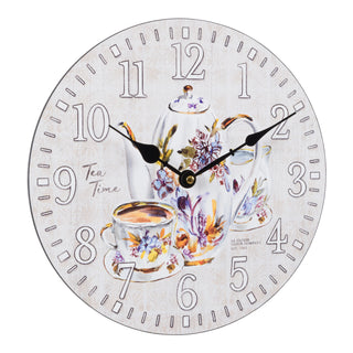 Right-facing image of the 404-2631T 12-inch Teatime Wall Clock. The clock features an image of a floral teapot and teacup on a light-textured background, with the text "Tea Time," white numbers, black metal hands, and an open face design.