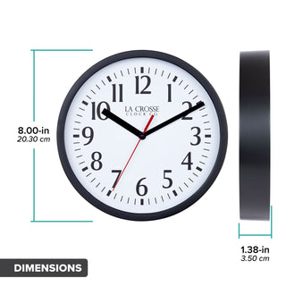 Dimension image in inches and centimeters of the 404-3020B 8-inch Basics Analog Wall Clock – Black featuring a black flush-mount frame, a white dial with black numbers, black hour and minute hands, and a red second hand. The clock is 8.0 inches in diameter and 1.38 inches deep.