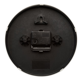 Back image of the 404-3020W 8-inch Basics Analog Wall Clock – White showing the battery compartment, the quartz movement, and the hanging hole.