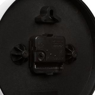 Close-up image of the back of the 404-3020W 8-inch Basics Analog Wall Clock – White showing the battery compartment, the quartz movement, and the hanging hole.