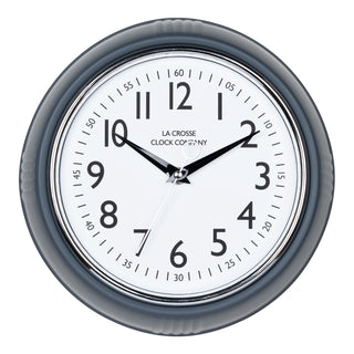 Head-on image of the 404-3024DS 9.5-inch Diner Clock – Dark Slate. The clock features a retro-style dark slate frame with a white dial, chrome bezel, black numbers and minute markings, black metal hands, and a silver second hand.