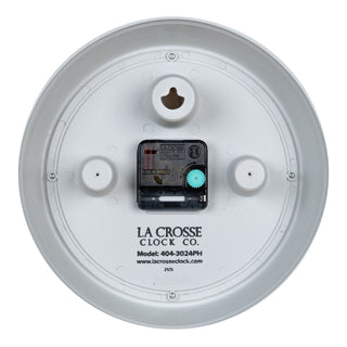 Back image of the 404-3024PH 9.5-inch Diner Clock – Pistachio Green, showing the battery compartment, the quartz movement, and the hanging hole.