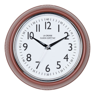 Head-on image of the 404-3024TC 9.5-inch Diner Clock – Terracotta. The clock features a retro-style terracotta frame with a white dial, chrome bezel, black numbers and minute markings, black metal hands, and a silver second hand.
