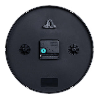 Back image of the 404-3025S 10-inch Basic Decor Wall Clock showing the hanging hole for mounting, easy set time wheel, the Quartz movement with battery compartment