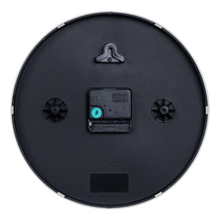 Back image of the 404-3025Y 10-inch Basic Decor Wall Clock showing the hanging hole for mounting, easy set time wheel, the Quartz movement with battery compartment