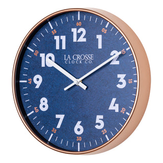 left facing blue eleven inch wall clock with white numbers copper time markings and a copper case and white hour and minute hands showing the depth of the case