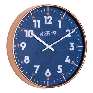right facing 404-3027c Portside navy blue eleven inch wall clock with white numbers orange time markings and a copper finish case and white hour and minute hands showing the depth of the case