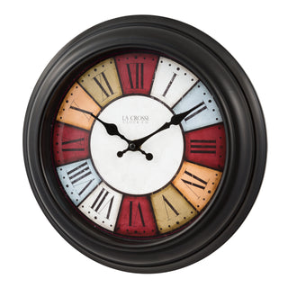 Left-facing image of the 404-3030A 12-inch Gatherings Wall Clock featuring a black decorative frame, a multi-color segmented dial with Roman numerals, and black hour and minute hands.