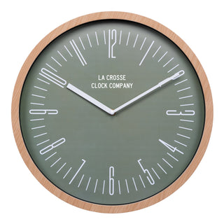 Wall clock with wooden frame and green face displaying 'La Crosse Clock Company'.