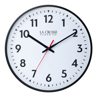 White wall clock with black numbers, red second hand, showing the time as 10:10.