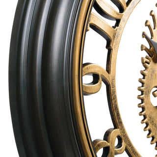Close-up clock with gold rim and black tire on a white background
