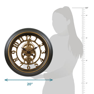 Decorative wall clock with gold intricate design, shown with a silhouette of a person for scale.