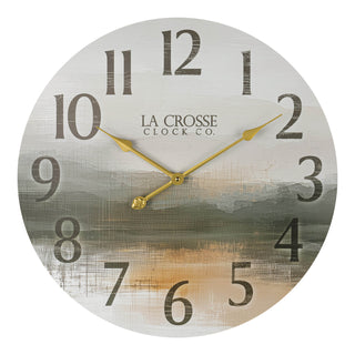 Head-on image of the 404-3461 24-inch Daybreak Wall Clock featuring an open face design of an impressionistic sunrise in muted tones, distressed numbers, and gold metal hands.