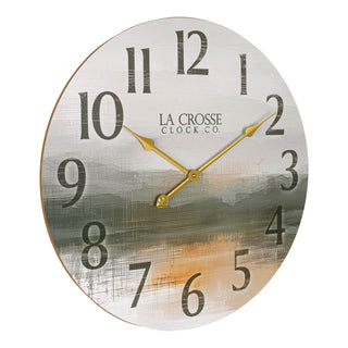 Right-facing image of the 404-3461 24-inch Daybreak Wall Clock featuring an open face design of an impressionistic sunrise in muted tones, distressed numbers, and gold metal hands.