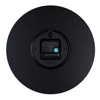 Back image of the 404-3630C 12-inch Sierra Wood Wall Clock showing the quartz movement, the battery compartment, and the hanging hole.