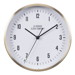 404-3715B A round wall clock with a white face, black numerals and hands, and a brushed gold-toned metal frame. The brand name 'LA CROSSE CLOCK COMPANY' is printed in black near the center.