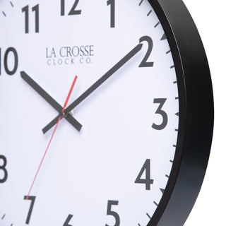 Close-up image of the flush-mount frame of the 404-3841 16-inch Commercial Wall Clock featuring bold black numerals, black hour markings, a white dial, black hour and minute hands, and a red second hand in a black flush-mount frame.