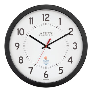 Head-on image of the 404-5537 14.5-inch Wall Clock with black bold numbers, black hour and minute hands, and a red second hand. Two logos apear on the clock, 
La Crosse Clock Co. and Chicago Lighthouse industries - a partner that employs the blind to bring this classic wall clock to consumers.