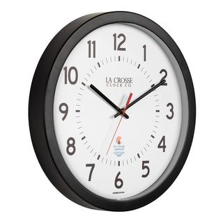 Right-facing image of the 404-5537 14.5-inch Wall Clock with black bold numbers, black hour and minute hands, and a red second hand. Two logos apear on the clock, 
La Crosse Clock Co. and Chicago Lighthouse industries - a partner that employs the blind to bring this classic wall clock to consumers.