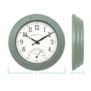 Green wall clock with white face and temperature gauge, showing dimensions on a white background.