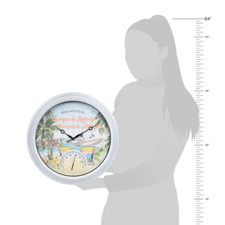 A round wall clock with a tropical beach illustration on the face, shown next to a gray silhouette of a person holding it for scale, with a vertical height measurement ruler on the right side.