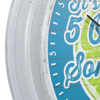 Close-up image of the whitewashed weathered frame of the 433-3841MV2T 15.75-inch Margaritaville® Indoor Outdoor Wall Clock with Temperature. The clock features a lime green and teal blue dial with an image of a lime with the text "it's 5 O'clock Somewhere," a temperature gauge, and black hour and minute hands, and a temperature pointer.