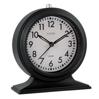617-3014 A black round desk clock with a white face, black numerals, and black hands, shown on a plain white background. The brand name 'LA CROSSE CLOCK CO.