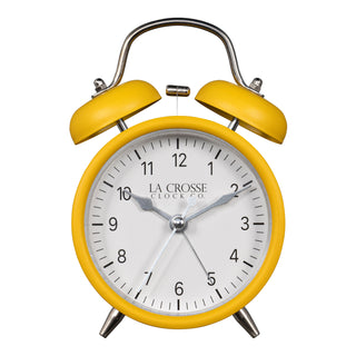 Head-on image of the 617-3314MY Metal Twin Bell Alarm Clock – Mustard Yellow, the clock features a white dial with black numbers, silver hands and accents, in a mustard yellow metal case.