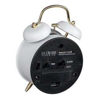 Angled back image of the 617-3314W Metal Twin Bell Alarm Clock – White, showing the battery compartment, knobs, and the on/off switch.
