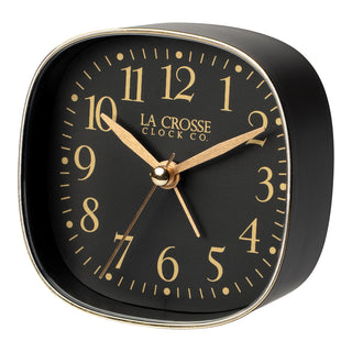 Left facing image of a retro style La Crosse Clock Co table top alarm clock with black dial gold numbers and gold accents.