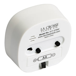 Back image of a tabletop alarm clock showing the dial functions battery compartment and depth of the white case with model number information screen printed displaying number 617-379W.