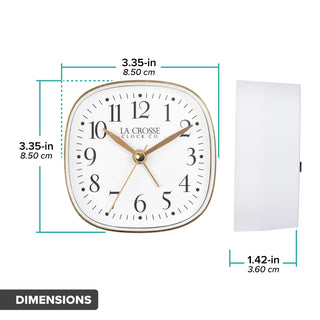 Head on and side view of a white and gold tabletop alarm clock with the dimensions listed in inches and centimeters.