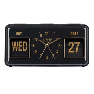 Head-on image of the 636-379B Daily Flip Tabletop Clock with Calendar – Black, featuring a retro design rectangular analog clock with brass numbers, hour, minute, and second hands, and a day and date calendar with manual flip cards with brass text.