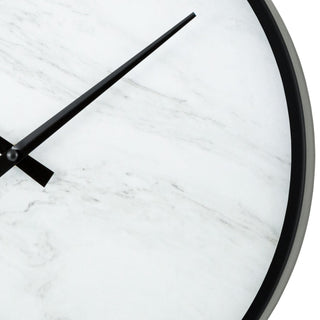 Closeup image of the frame of the 83216-BHG 14-inch Faux Marble Wall Clock featuring a thin black frame, a faux-marble face, no numbers or markings, and modern black hands.