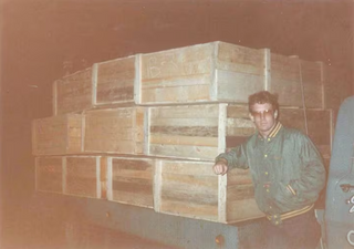 Early years of La Crosse Technology founder Allan McCormick with a delivery of German made grandfather clocks